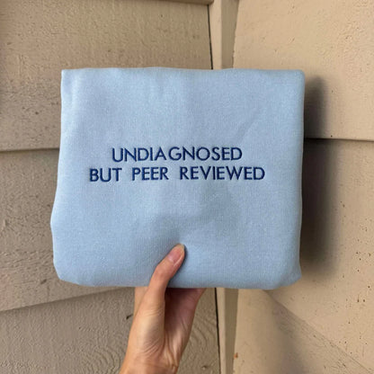 UNDIAGNOSED BUT PEER REVIEWED EMBROIDERED CREW NECK / HOODIE