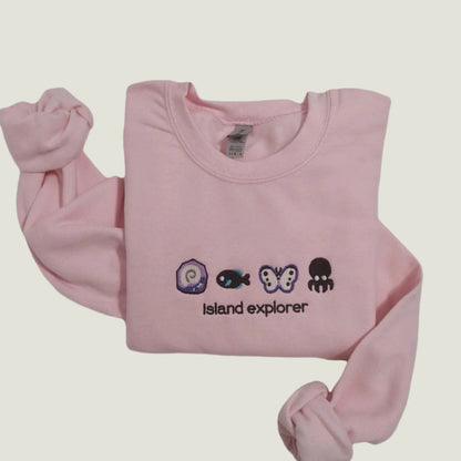 ISLAND EXPLORER BESTICKTES CREW NECK / HOODIE