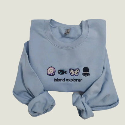 ISLAND EXPLORER BESTICKTES CREW NECK / HOODIE