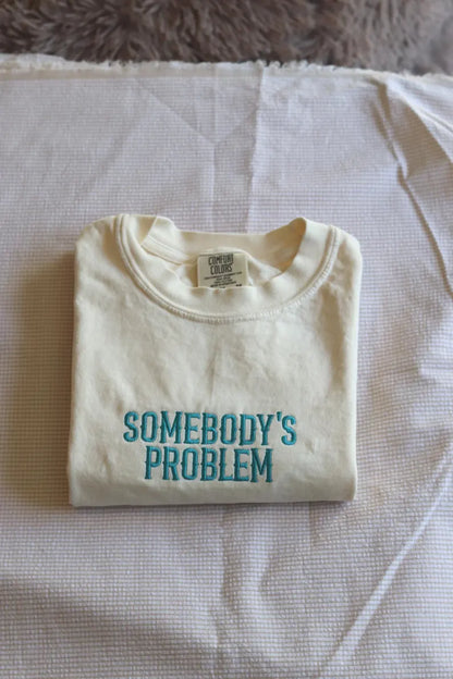 SOMEBODY’S PROBLEM EMBROIDERED CREW NECK / HOODIE